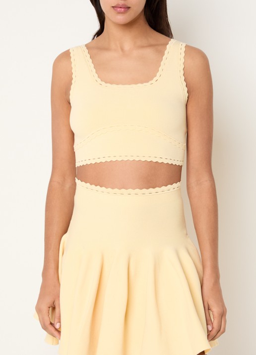 Sandro Fijngebreide crop top met broderie detail