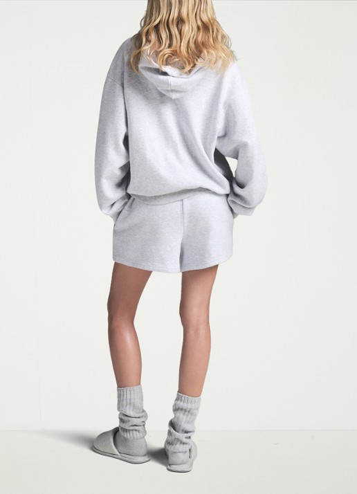 SKIMS Cotton Fleece hoodie met kangoeroezak - achterkant grijsmele