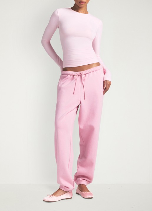 SKIMS Cotton Jersey longsleeve met ronde hals - voorkant 2 cherry blossom