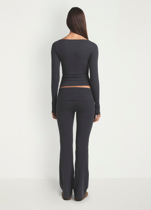 SKIMS Cotton Jersey mid waist flared legging met omgeslagen tailleband - achterkant donkergrijs