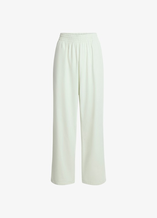 SKIMS Cotton Jersey mid waist wide fit loungebroek met steekzakken - voorkant 4 lichtgroen
