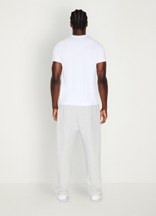 SKIMS Fleece Lounge joggingsbroek met steekzakken - achterkant light heather grey