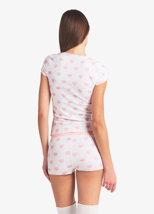 SKIMS Pointelle pyjamaset met print - achterkant snow lace hearts