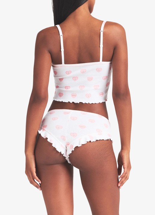 SKIMS Pointelle pyjamaset met print  - achterkant 3 snow lace hearts