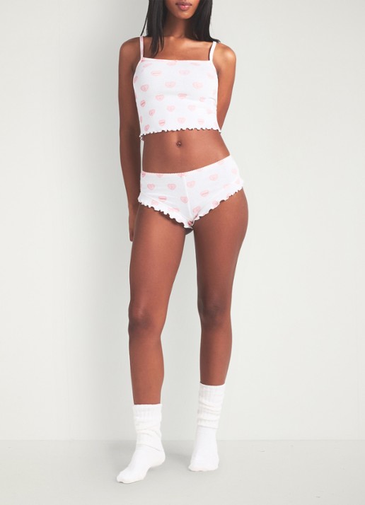 SKIMS Pointelle pyjamaset met print  - voorkant 2 snow lace hearts