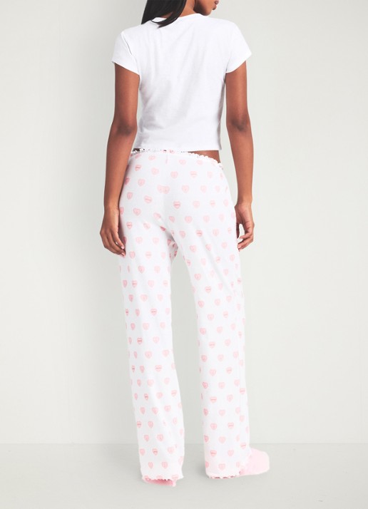 SKIMS Pointelle straight fit pyjamabroek met print - achterkant snow lace hearts