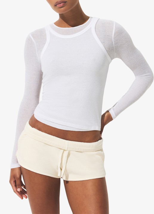 SKIMS Semi-transparante tanktop met ribstructuur