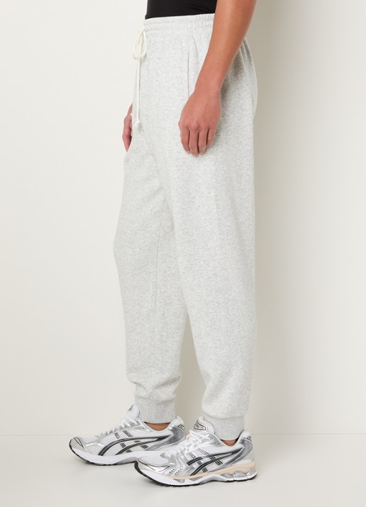 SKIMS Tapered fit joggingbroek met steekzakken - detail 3 light heather grey