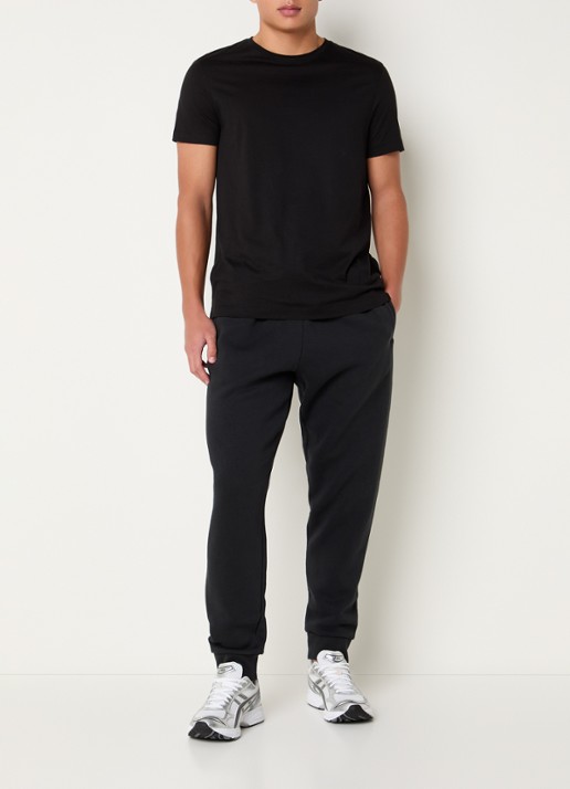 SKIMS Tapered fit joggingbroek met steekzakken - voorkant 7 washed onyx