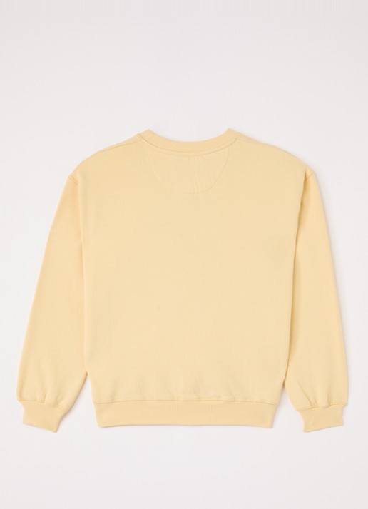 The New Society Sweater met logoprint - voorkant 3 lichtgeel