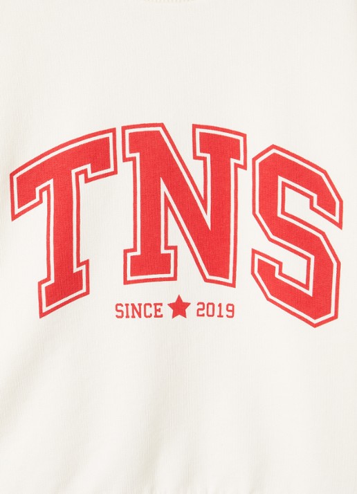 The New Society Tansy sweater met logoprint - detail creme