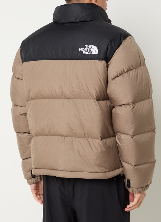 The North Face 1996 Retro Nuptse puffer jack met donsvulling  - achterkant lichtbruin