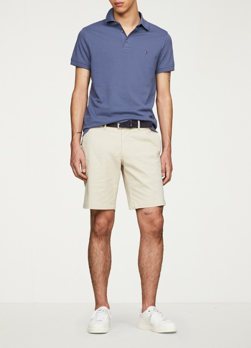 Tommy Hilfiger 1985 slim fit polo met logoborduring - voorkant 6 faded indigo / blauw