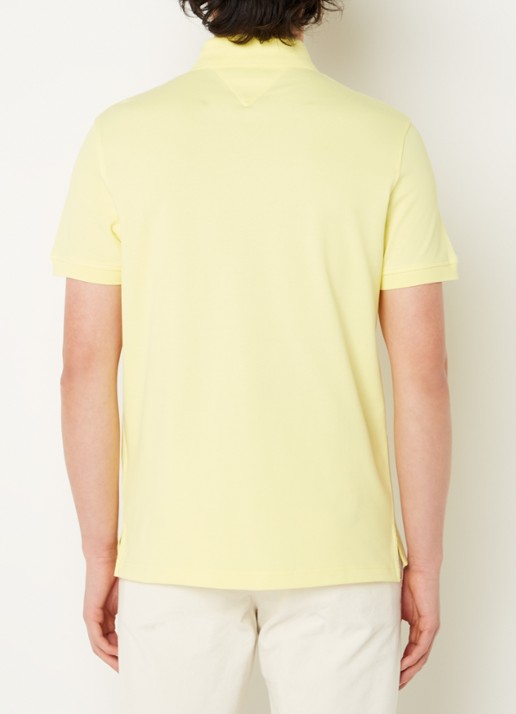 Tommy Hilfiger Core regular fit polo van piqué katoen met logoborduring - achterkant yellow tulip / geel