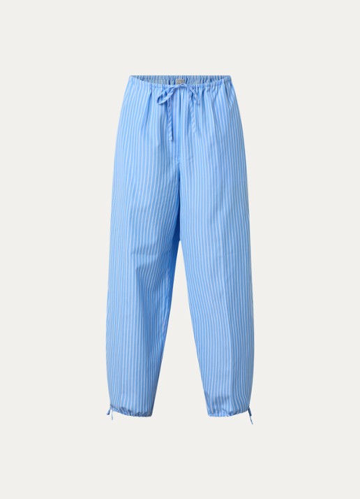 TOTEME High waist tapered fit broek met streepprint en gestrikt detail - voorkant lichtblauw