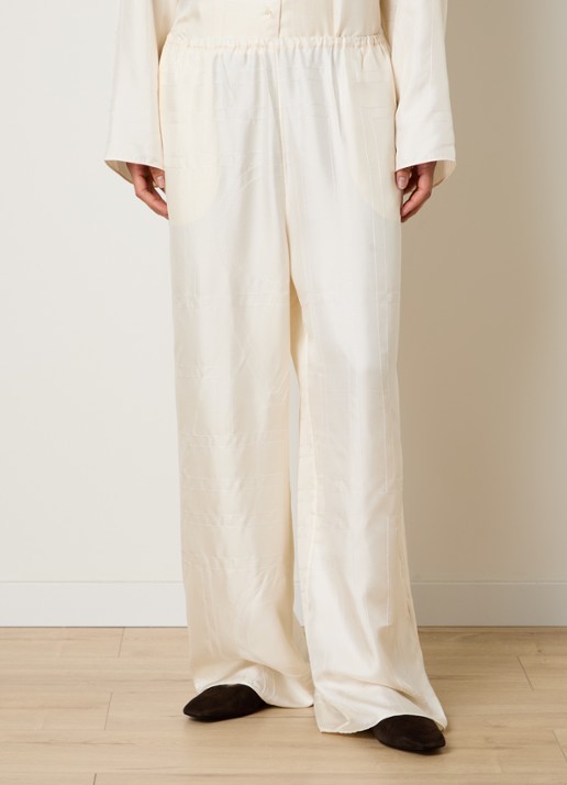 TOTEME Monogram low waist wide fit broek van zijde met logoborduring
