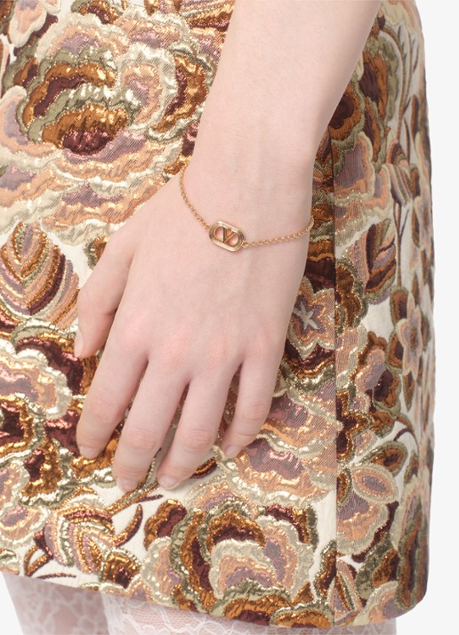 Valentino Garavani Ovalette armband met logo - voorkant 2 goud