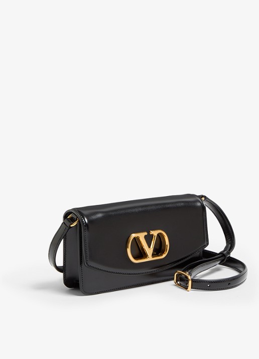 Valentino Garavani Vain Small clutch van kalfsleer met afneembare schouderriem - detail zwart