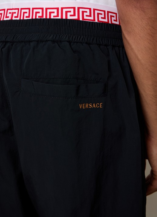 Versace Wide fit trackpants met steekzakken en logo - detail 5 zwart