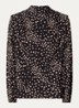 Delphine top met stippenprint en asymmetrisch detail - Zwart