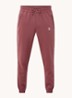 Etape tapered fit cropped trackpants met ritszakken en logoband - Roodbruin