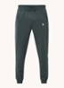 Etape tapered fit cropped trackpants met ritszakken en logoband - Bronsgroen