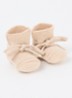 Gebreide babyslofjes van wol - Creme