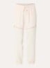 High waist tapered fit trackpants met elastische band en ritszakken - Creme