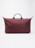 Le Pliage One reistas XL met leren details - Bordeauxrood