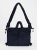 Ona gewatteerde crossbodytas van corduroy - Donkerblauw
