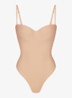 Skims Body corrigerende stringbody met beugel - Beige